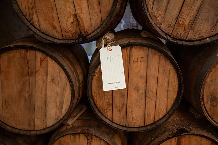 Stacked barrels of The Lost Explorer Tequila Reposado during the aging process